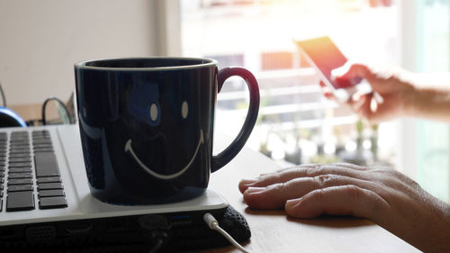 Coffee cup on table