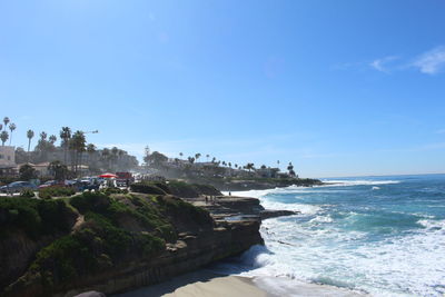 Scenic view of sea against blue sky