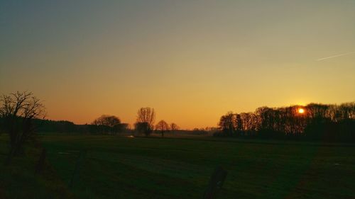 Scenic view of landscape at sunset