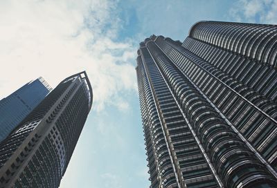 Low angle view of modern buildings against sky