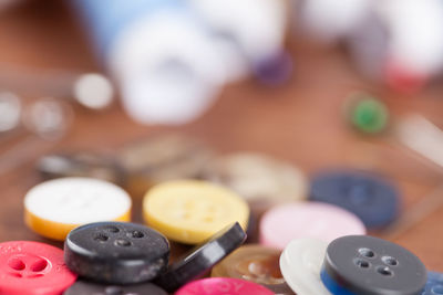 Close-up of buttons on table