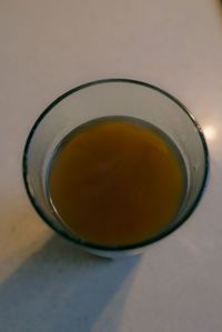 High angle view of tea in glass on table