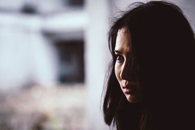 Portrait of woman looking away