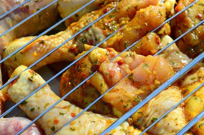 High angle view of meat on barbecue grill