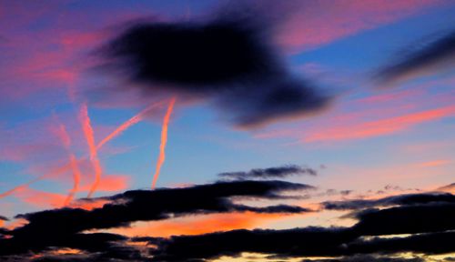Low angle view of dramatic sky during sunset