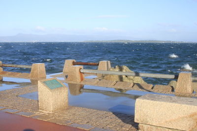 Scenic view of sea against blue sky