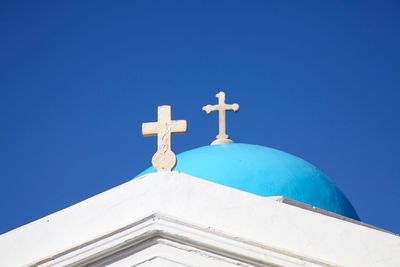Low angle view of church against clear blue sky