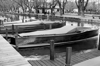 Boats moored in water