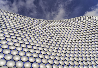 Close-up of modern building against sky