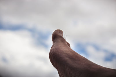 Midsection of man against sky