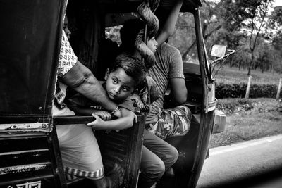 People sitting in rickshaw