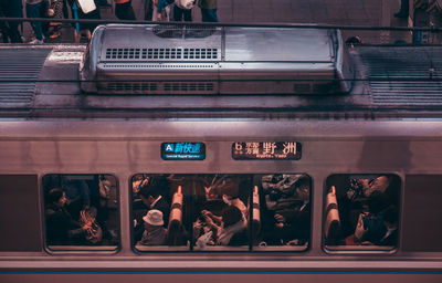 Group of people at railroad station platform