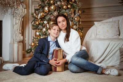 Christmas portrait of a mother and son.