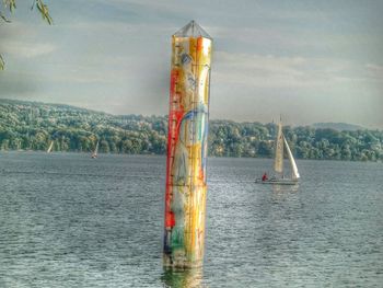 Boats sailing in sea