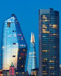 Modern buildings against blue sky