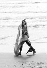 Full length of woman on beach