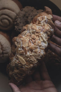 Close-up of hand holding ice cream