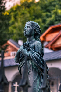 Salzburg, austria - september 15, 2020 - petersfriedhof salzburg cemetery statue