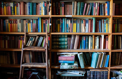 Books arranged on shelf