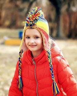 Portrait of smiling girl in snow