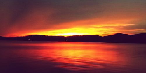 Scenic view of sea at sunset