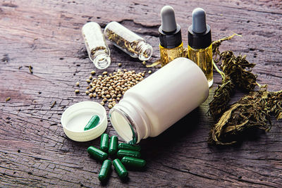 High angle view of bottles on table