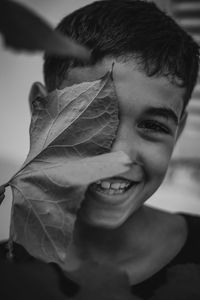 Close-up portrait of smiling boy