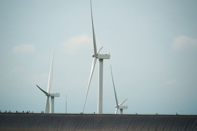 Low angle view of windmill against clear sky