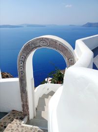 High angle view of greek arch against sea and sky