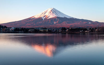 Mount fuji at dawn with alpine glow