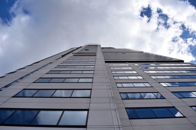 Low angle view of modern building against sky