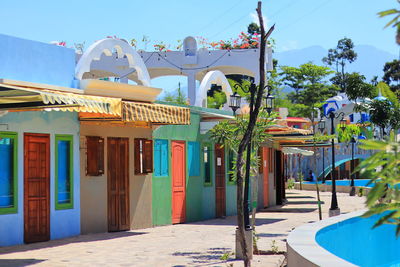 View of swimming pool by building