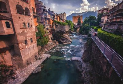 Canal amidst buildings in town