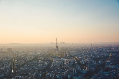 Cityscape against sky during sunset