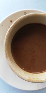 High angle view of coffee cup on table