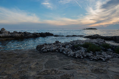 Scenic view of sea against sky during sunset