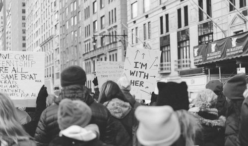 People on street in city protesting women rights