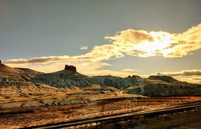 View of landscape against cloudy sky