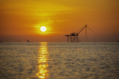 View of pakpra early in the beautiful morning. vintage bamboo fish trap machine