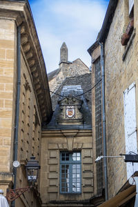 Low angle view of old building against sky