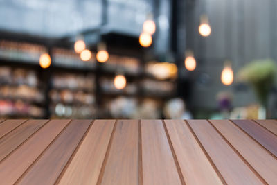 Close-up of illuminated table at night