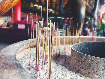 Burning incense sticks at temple
