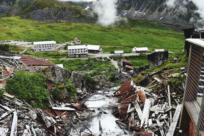 High angle view of buildings on field