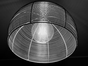 Low angle view of illuminated electric lamp