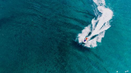 Aerial view of speedboat in sea