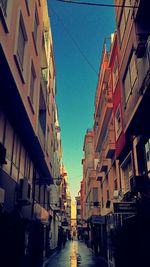 Narrow alley along buildings