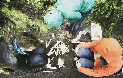 High angle view of people camping in forest