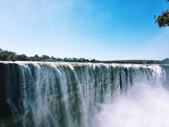 Scenic view of victoria falls against sky