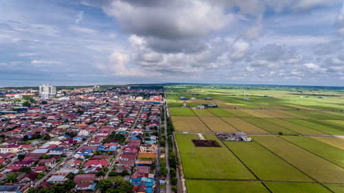 High angle view of soccer field against sky