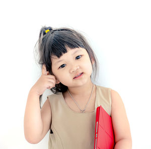Portrait of a smiling girl over white background